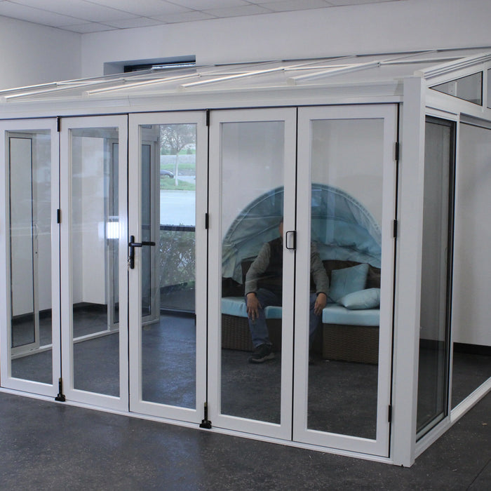 Installation: Tempered Glass Sunroom with Bi-Fold Doors – White (12' Wide)