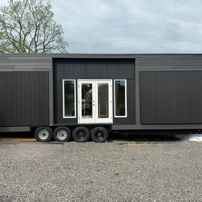 How One Builder Turned a Trailer into an All-Black Mobile Gym Using Composite Cladding