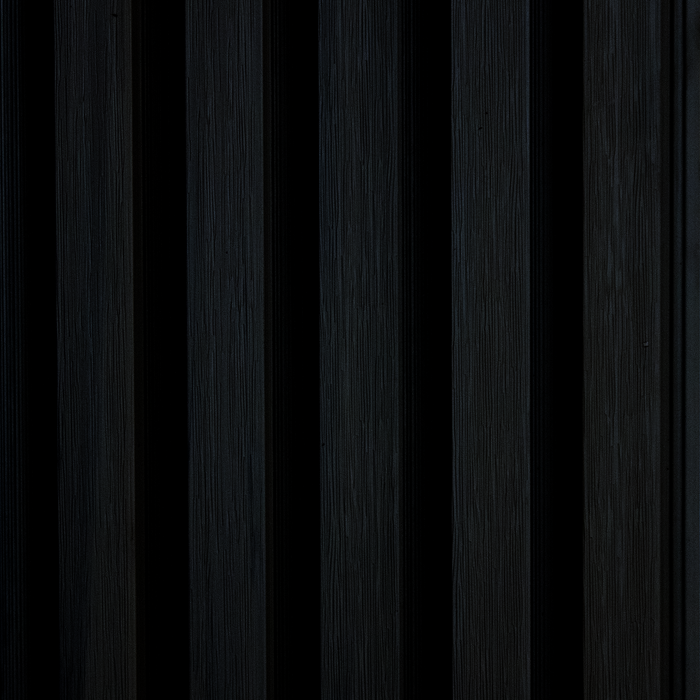 Dark wooden panel with vertical grain pattern