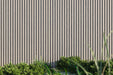 Seaside Oak Composite Slat Wall Panels Embossed Wood Grain Finish With Black Accents